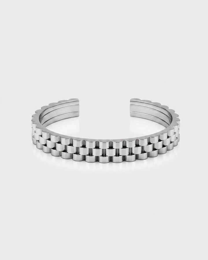 Elli Jewellery rhodium plated cuff bangle with a textured link-style design in a polished silver-toned finish.