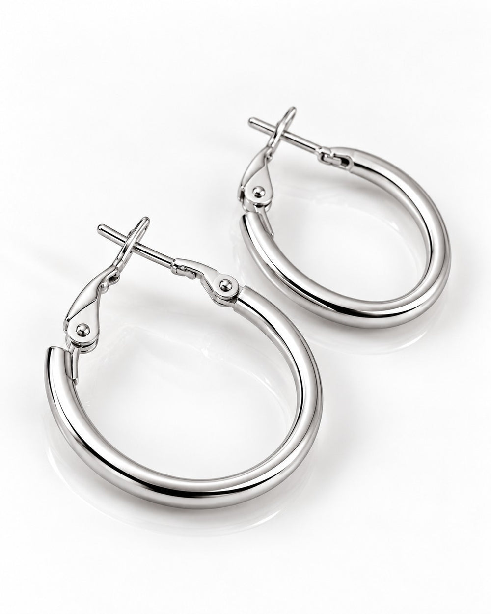 Elli Jewellery rhodium plated hoop earrings with a polished silver finish and secure hinged clasp on white background