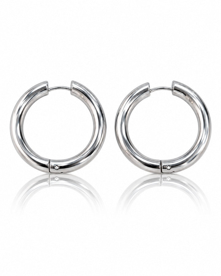 Elli Jewellery rhodium plated mid hoop earrings with a polished, waterproof finish on a white background.