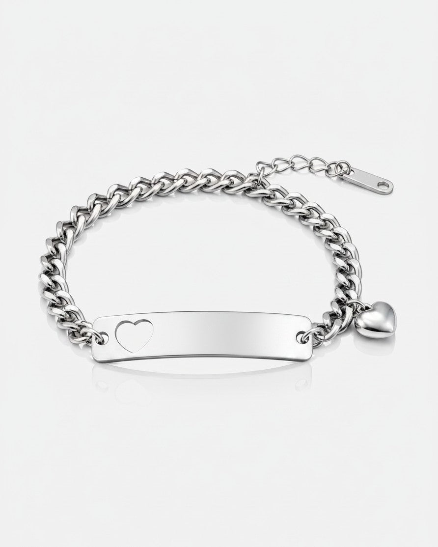 Elli Jewellery silver plated curb chain bracelet featuring a heart ID tag and a small dangling heart charm.