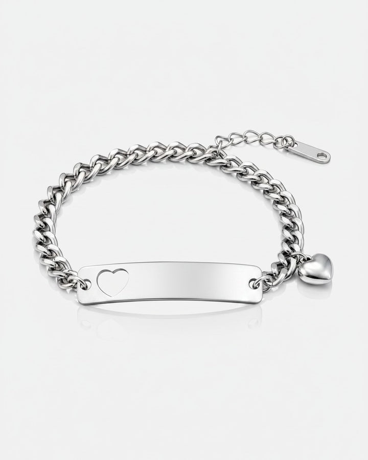 Elli Jewellery silver plated curb chain bracelet featuring a heart ID tag and a small dangling heart charm.