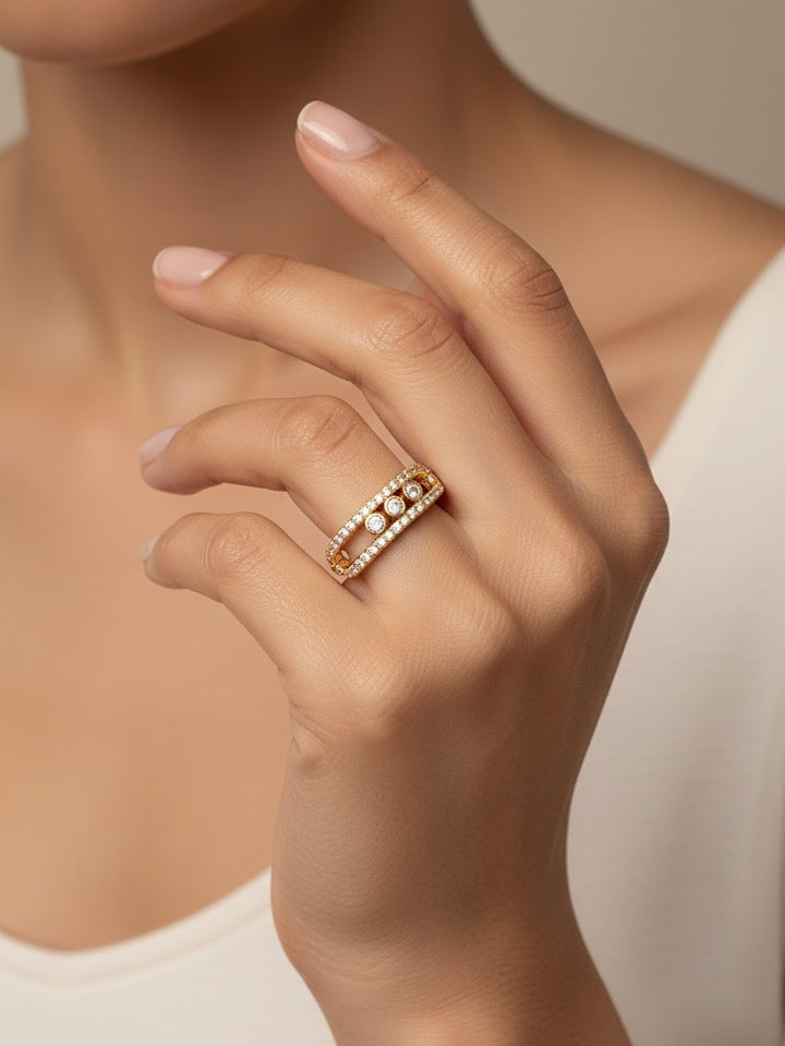 Elli Jewellery triple band gold plated ring with pavé crystals and bezel-set stones worn on a finger