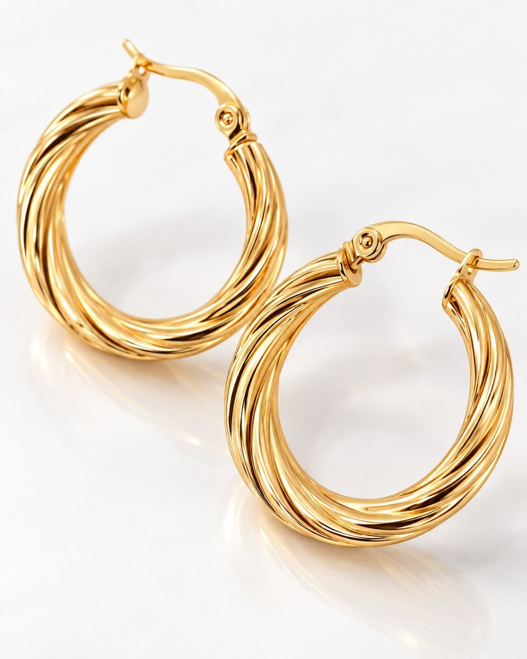 Elli Jewellery 18ct gold plated hoop earrings featuring a detailed twisted rope texture and secure lever-back clasp.