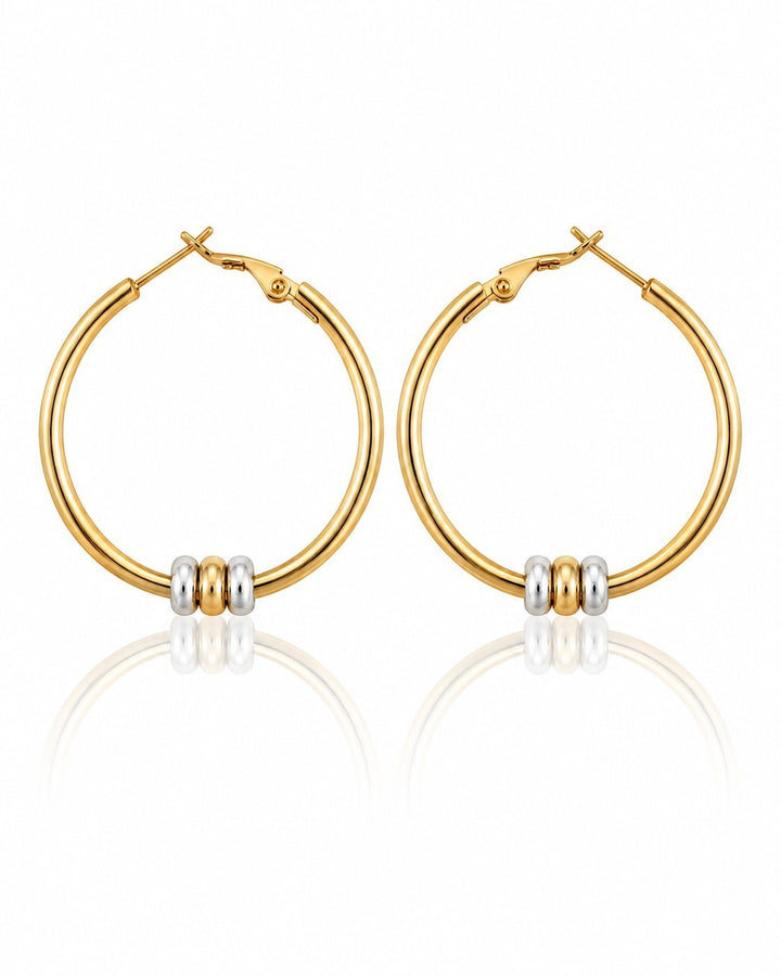 Elli Jewellery two-tone hoop earrings featuring gold-plated circles with rhodium and gold-tone accent beads.