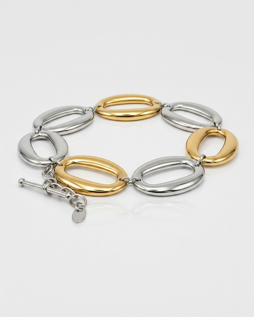 Elli Jewellery two-tone chunky chain link bracelet featuring alternating polished gold and silver oval links.