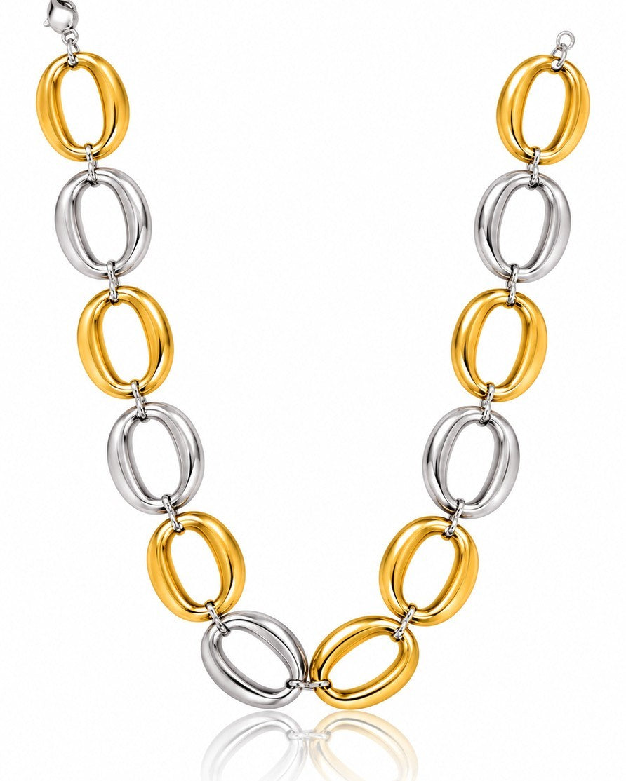 Elli Jewellery two-tone chunky chain link necklace featuring alternating gold and silver-tone oval links.