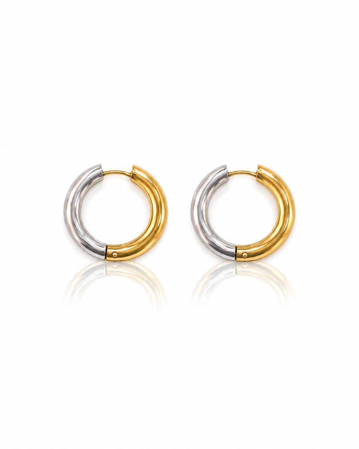 Elli Jewellery 20mm chunky huggie hoop earrings featuring a two-tone gold and silver plated design.
