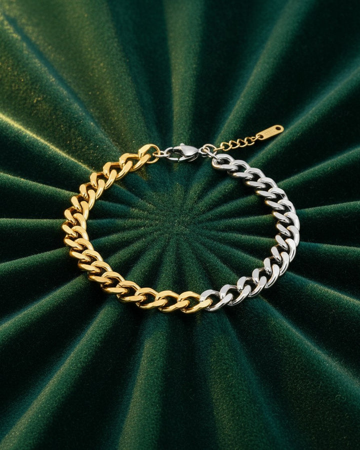 Elli Jewellery two-tone Cuban link chain bracelet featuring alternating gold and silver plated metal links.