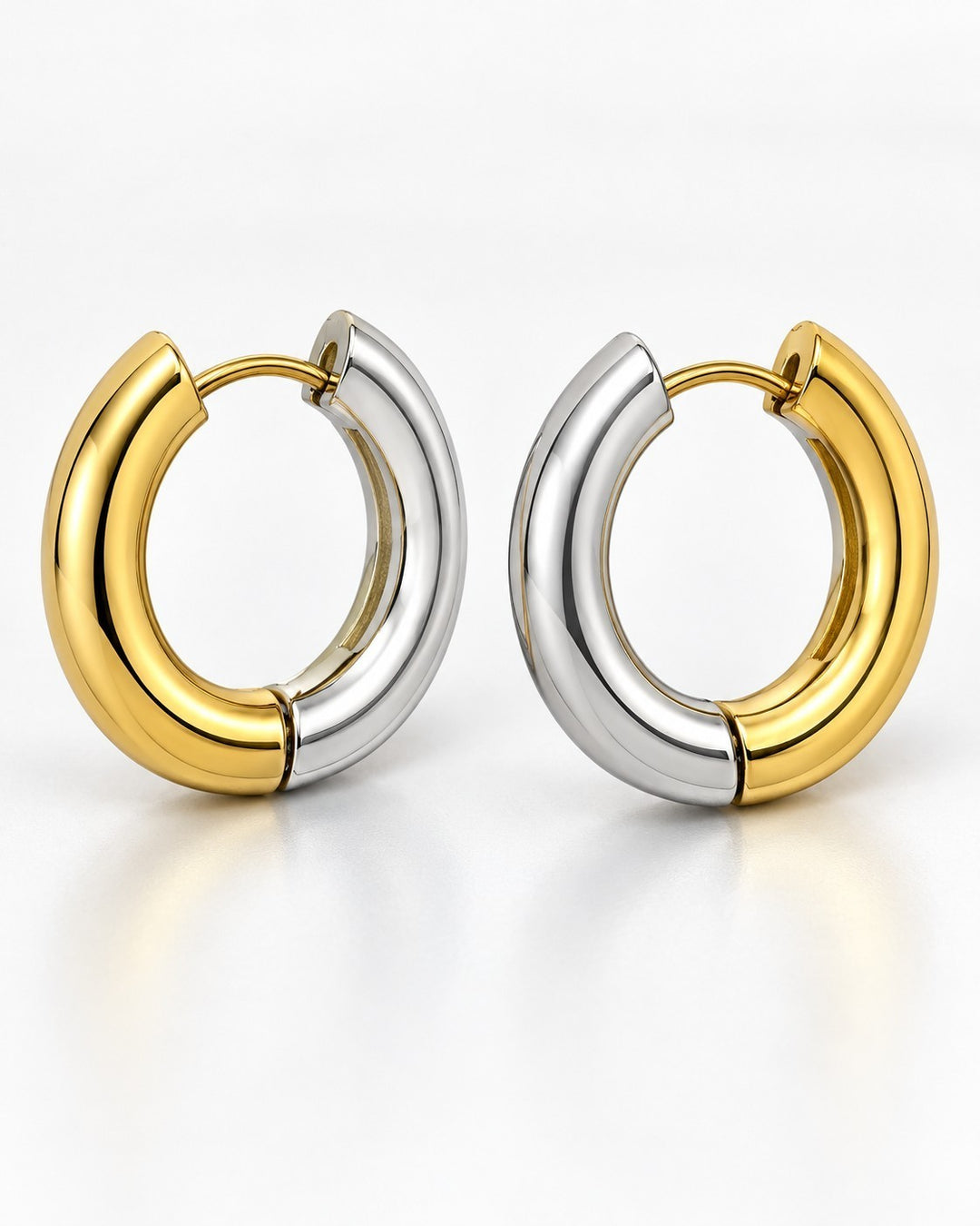 Elli Jewellery 18mm two-tone huggie hoop earrings featuring a polished gold and silver plated finish
