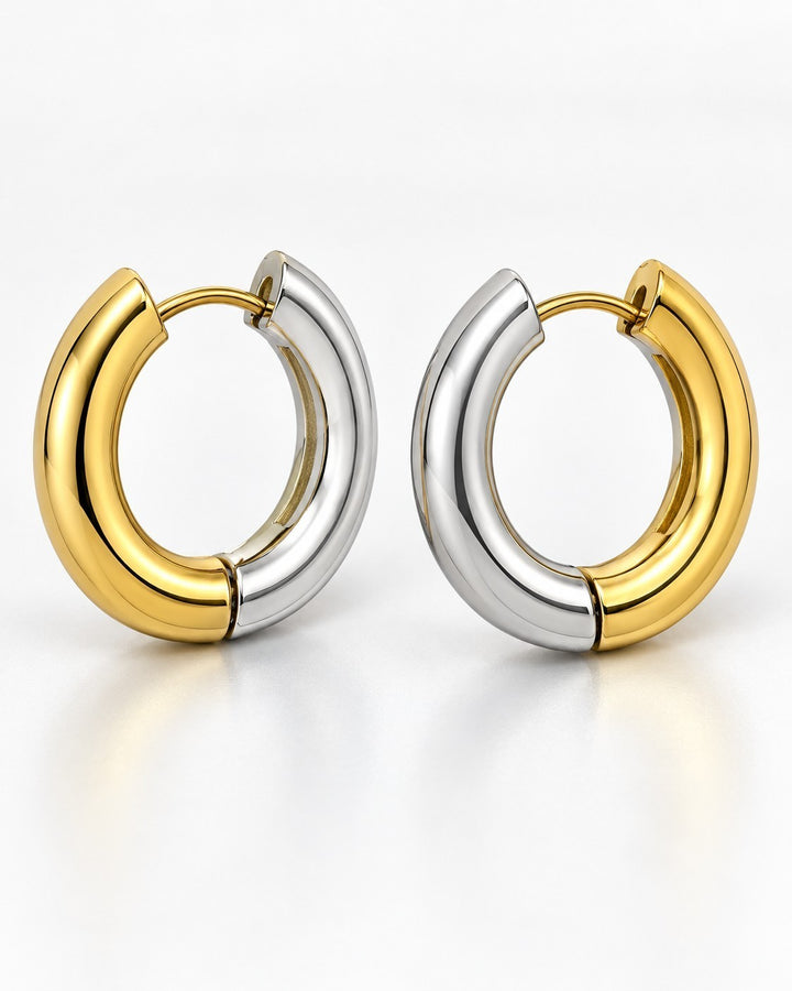 Elli Jewellery 18mm two-tone huggie hoop earrings featuring a polished gold and silver plated finish