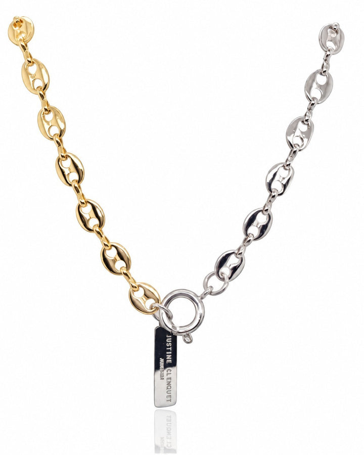 Elli Jewellery two-tone oval link chain necklace featuring gold and silver plating with a toggle clasp and logo charm.
