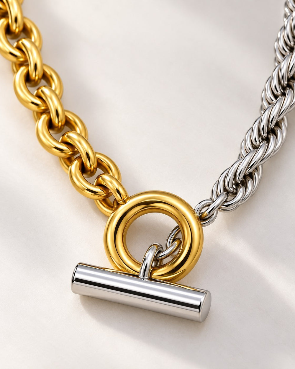 Elli Jewellery two-tone chunky rope chain necklace featuring gold and silver links with a toggle clasp closure