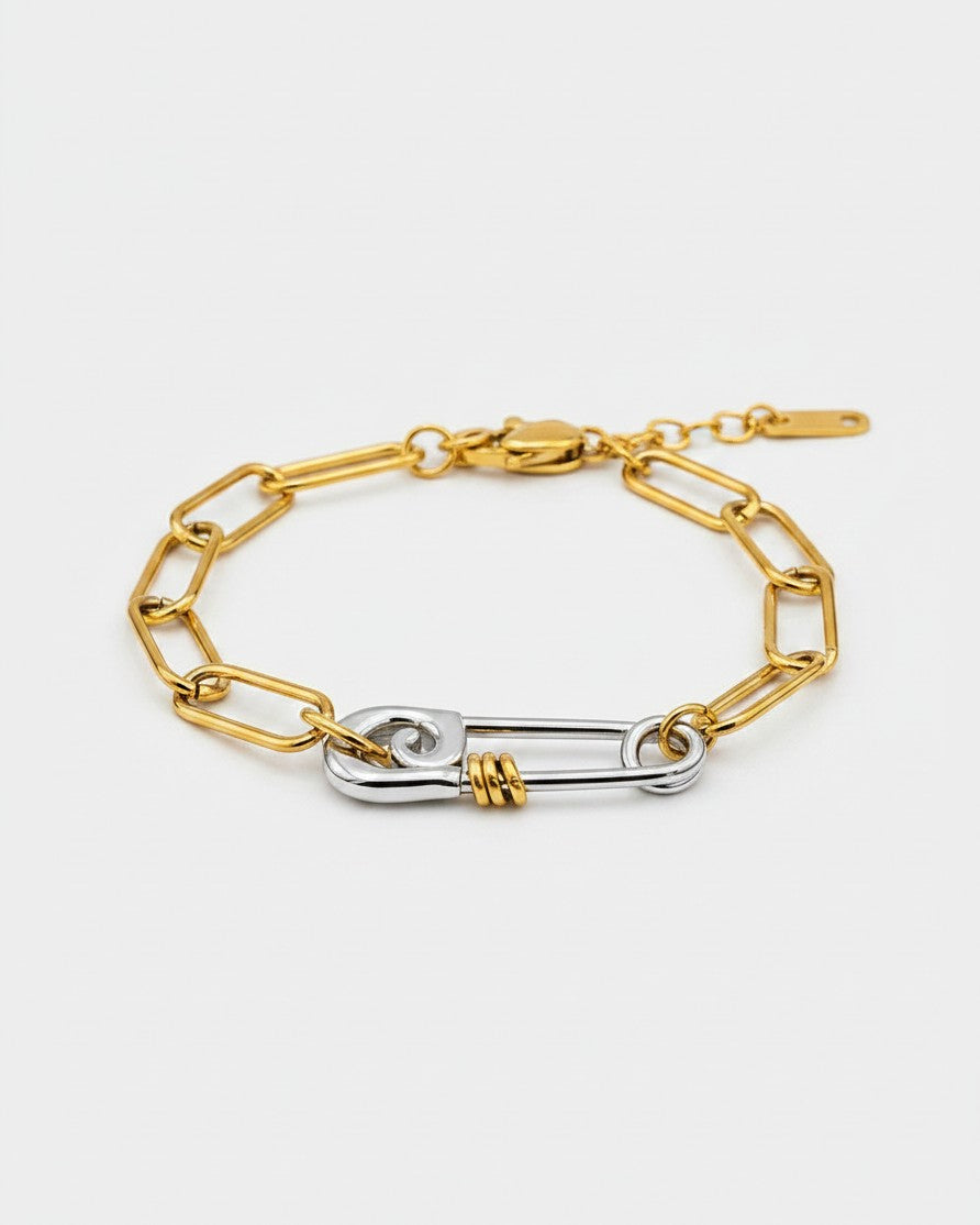 Elli Jewellery two-tone gold plated and silver chain link bracelet featuring a unique safety pin clasp design.