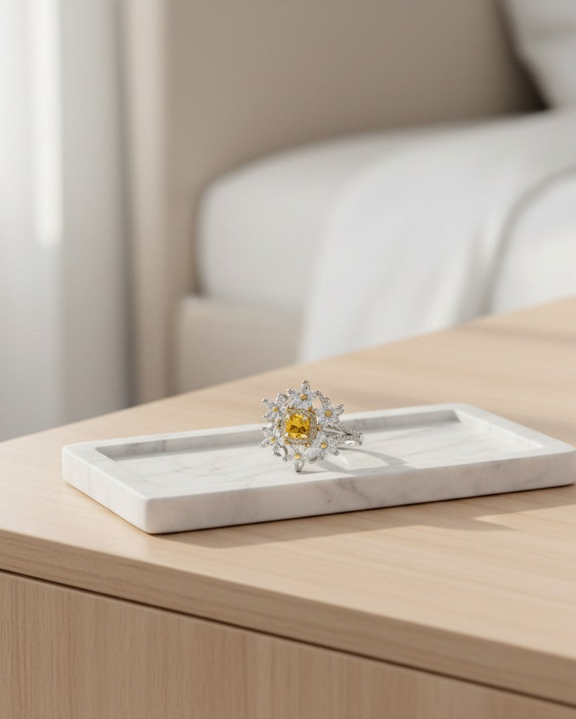 Elli Jewellery silver plated statement ring featuring a vibrant yellow cubic zirconia stone in a floral petal design.