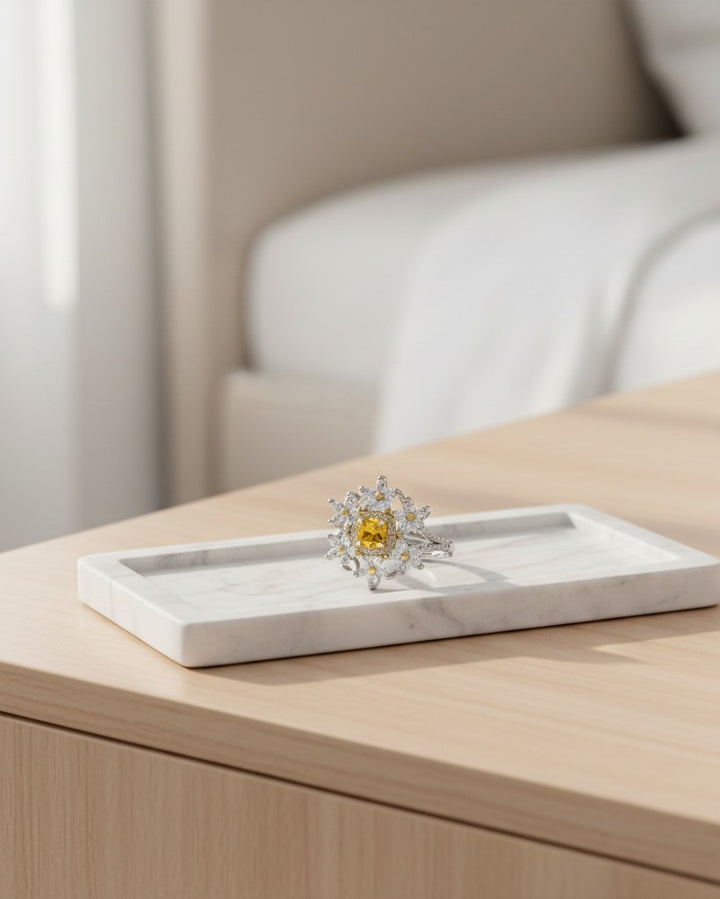 Elli Jewellery silver plated statement ring featuring a vibrant yellow cubic zirconia stone in a floral petal design.