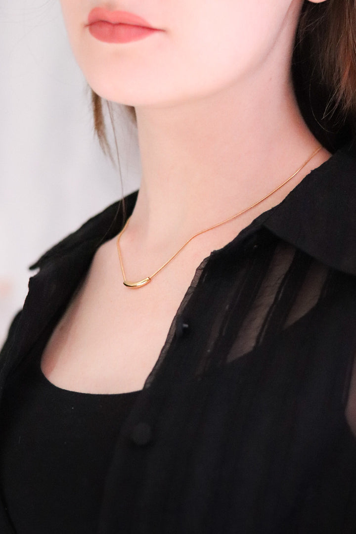 Gold Plated Snake Necklace with Tusk Shaped Pendant