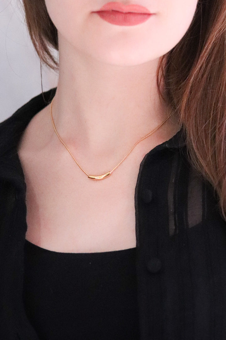 Gold Plated Snake Necklace with Tusk Shaped Pendant