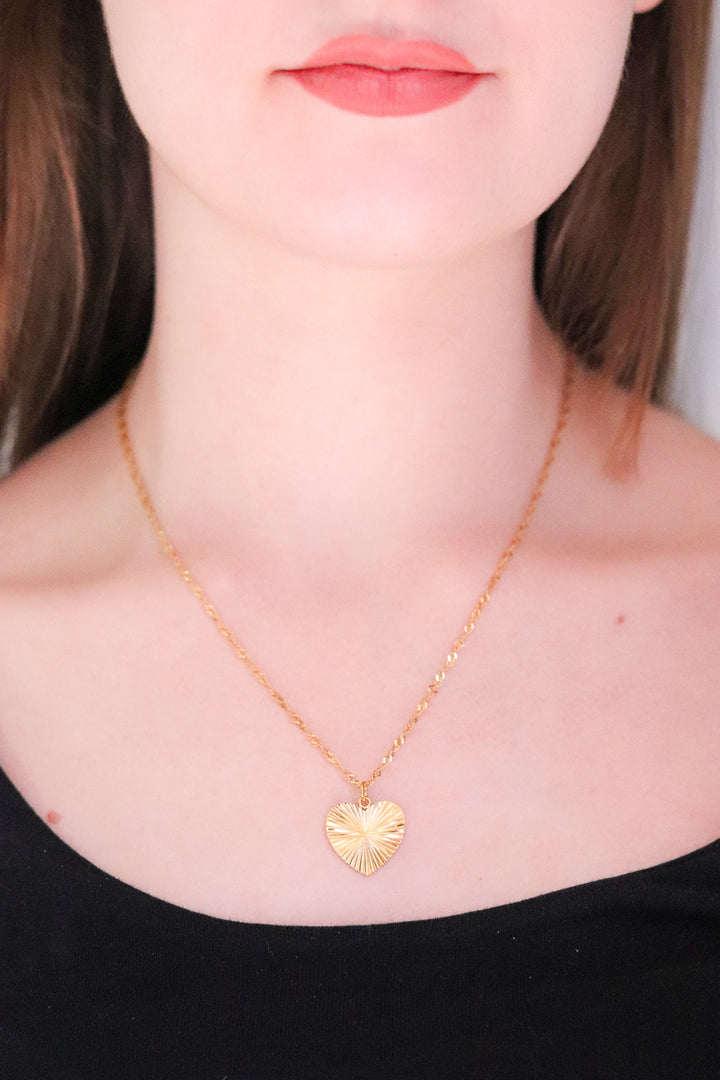 Gold Toned Necklace and Patterned Heart Pendant