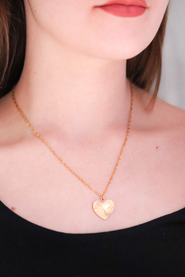 Gold Toned Necklace and Patterned Heart Pendant